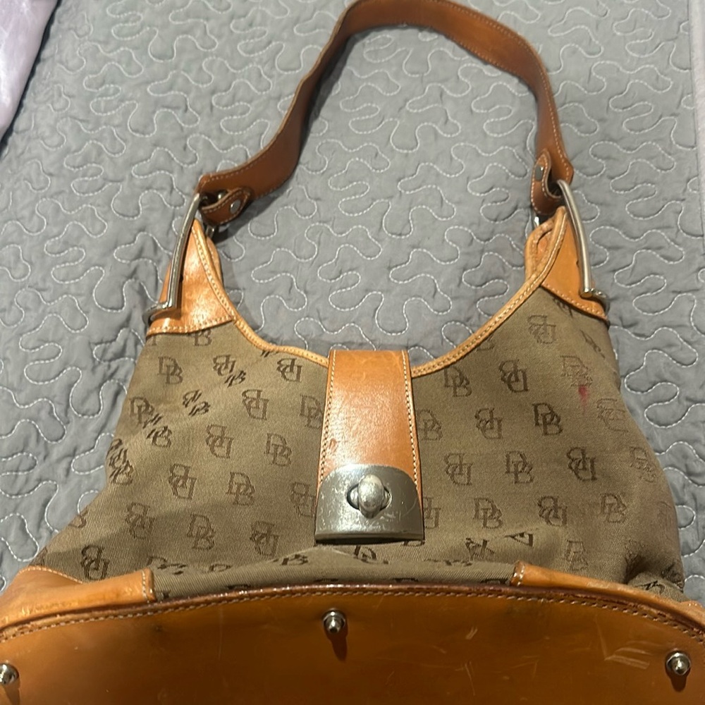 Dooney and Bourke inc leather strap slightly worn